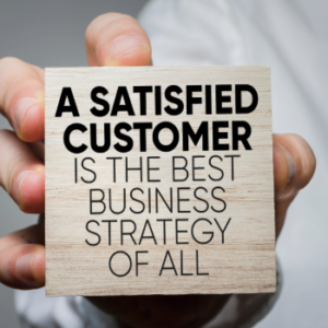 Customer Service Slogan on a piece of wood.